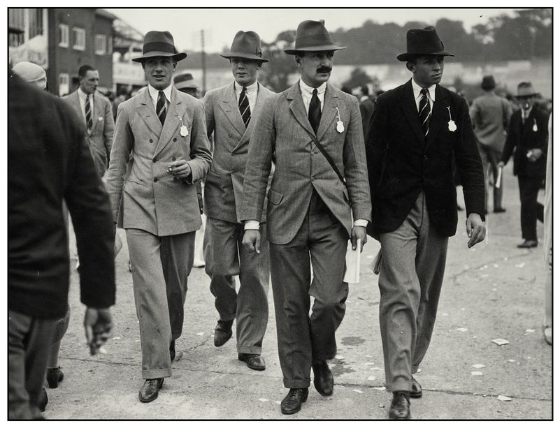 1920s guy fashion style with suits, hats, and shoes