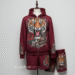 The burgundy Ed Hardy set is more than just a tracksuit; it's a wearable piece of art that captures the rebellious and expressive spirit of the Y2K era.