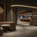 A wide shot of the modern and luxurious lobby of Harkins Fashion Square, with guests waiting near the concession stand.