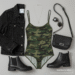A woman confidently wearing a stylish camouflage bodysuit paired with black jeans in a modern urban setting.