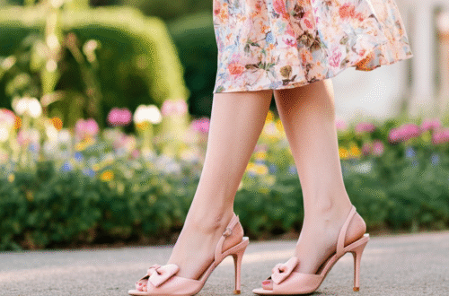 A stylish woman wearing elegant light pink bow heels with a floral summer dress.