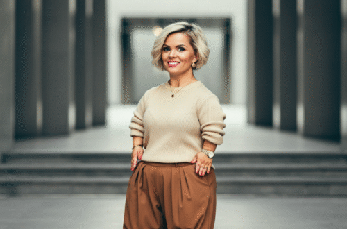 A confident and stylish short girl smiling, wearing a well-fitted outfit that flatters her petite frame.